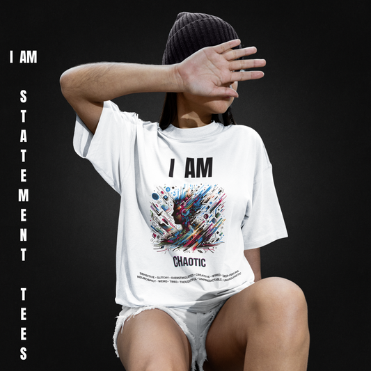 Model wearing I AM CHAOTIC t-shirt by Mentally Glitched, seated with a neutral black background