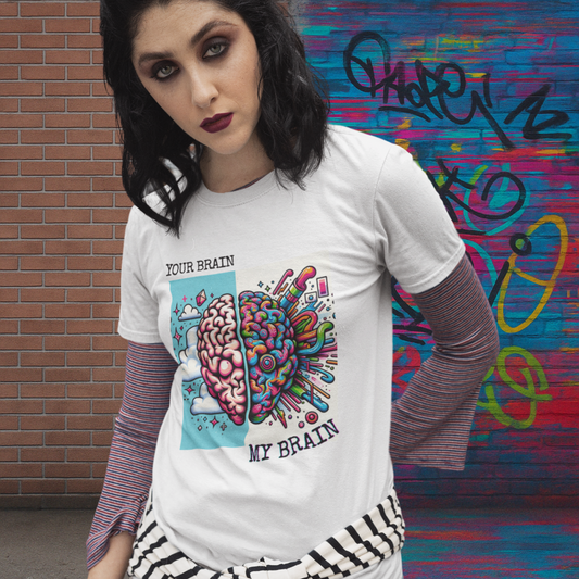  Woman wearing the "My Brain vs Your Brain" t-shirt in front of a wall split between clean bricks and glitchy neon graffiti, matching the shirt’s message.